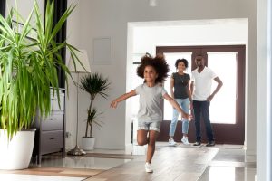 Happy Alberta family with new front entry door installation | GreenFox Windows & Doors