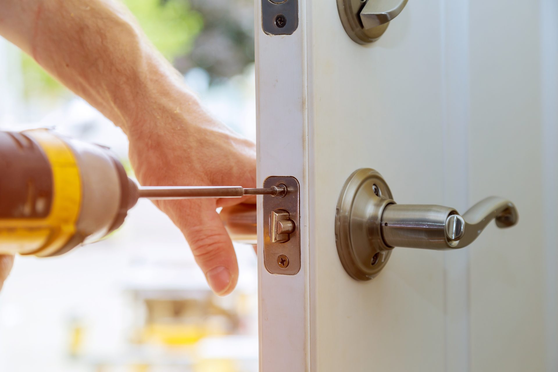 front door installation services by man working for greenfox windows and doors in Chestermere