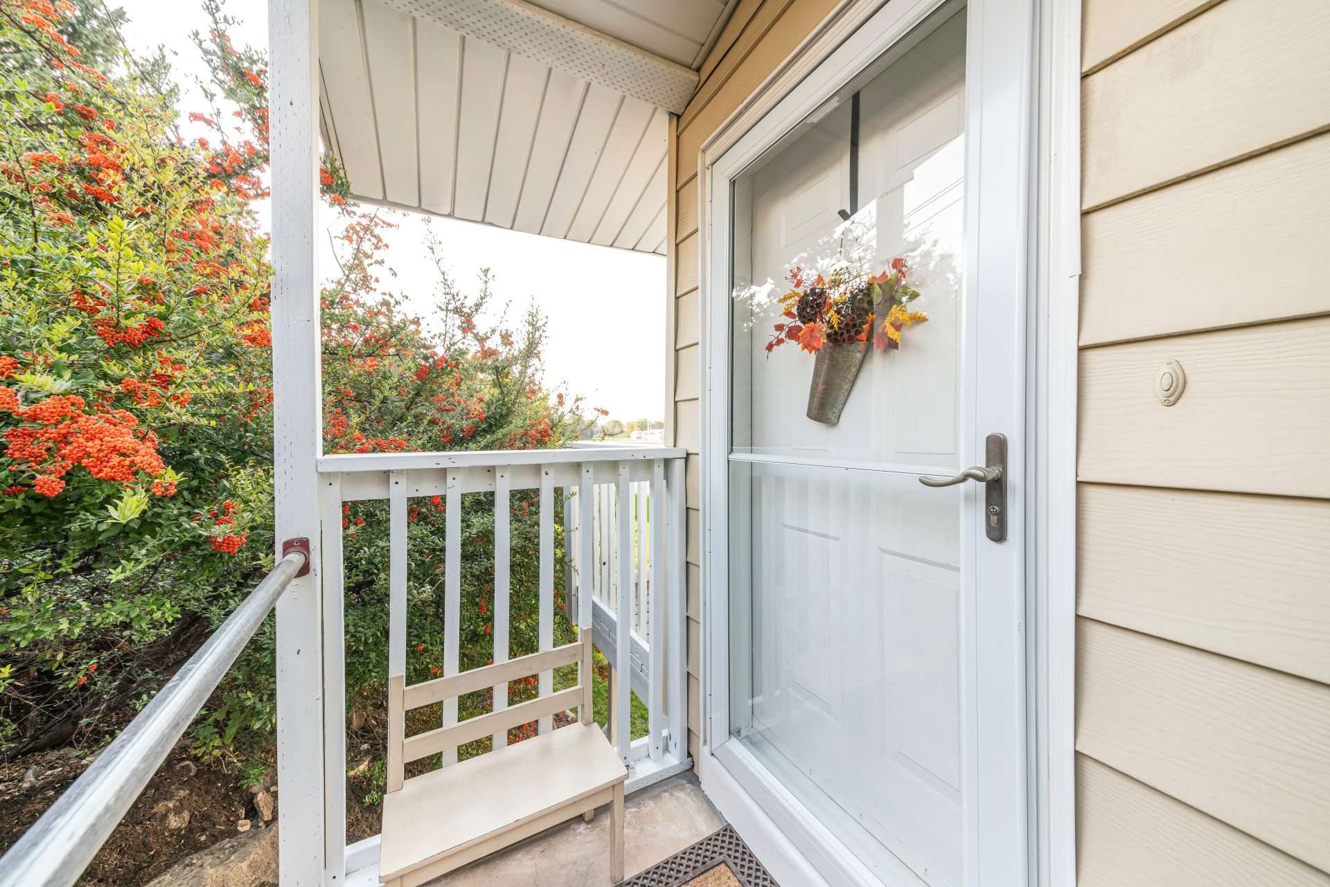 Durable storm door installers near me on a residential home in Fort Saskatchewan by GreenFox Windows & Doors