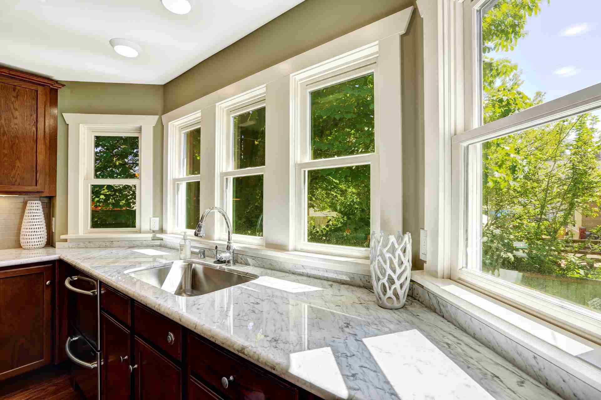 Beautiful replacement windows installed by GreenFox Windows & Doors in Cochrane, enhancing home aesthetics and energy efficiency.