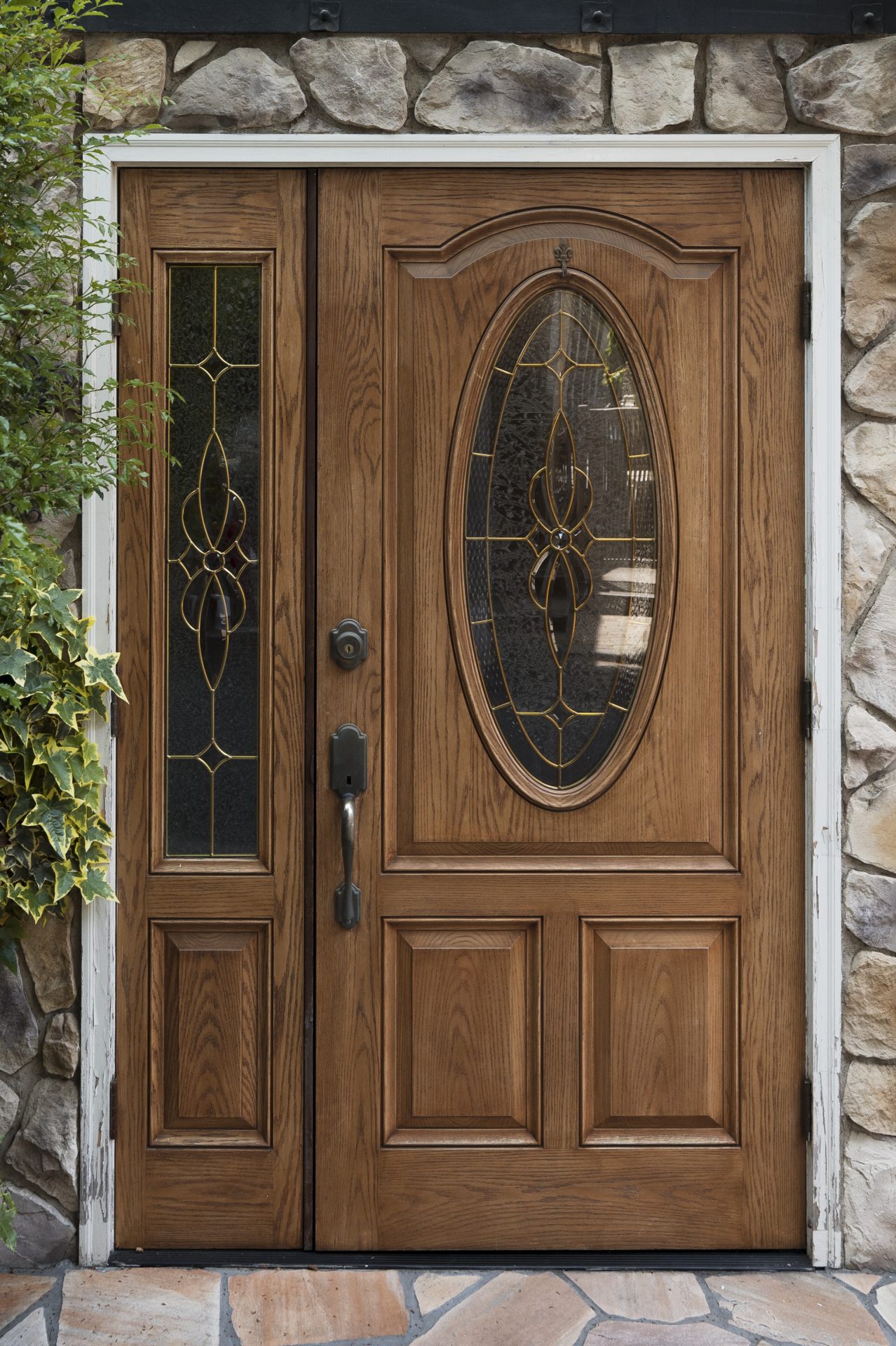 Classic wooden entry door with sidelight